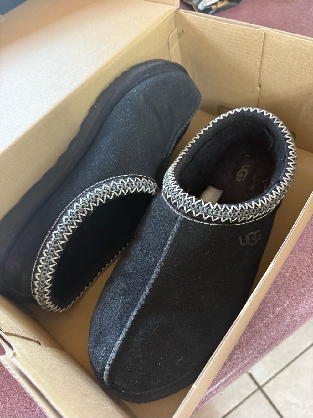 UGG Men's Black Suede Slip-On Moccasin Slippers with Contrast Stitch